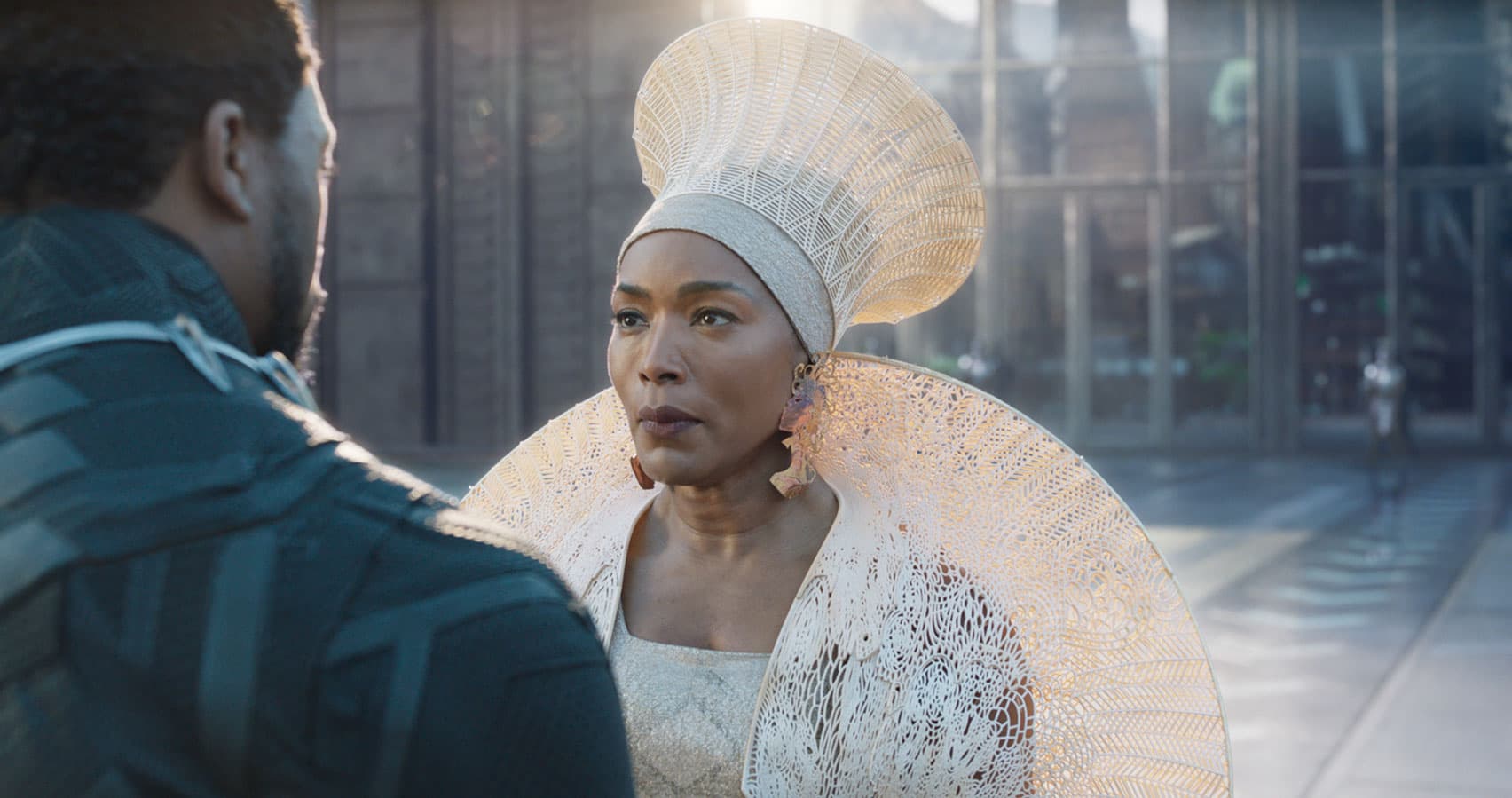 a screenshot of Queen Ramonda in her royal headdress in Marvel’s Black Panther