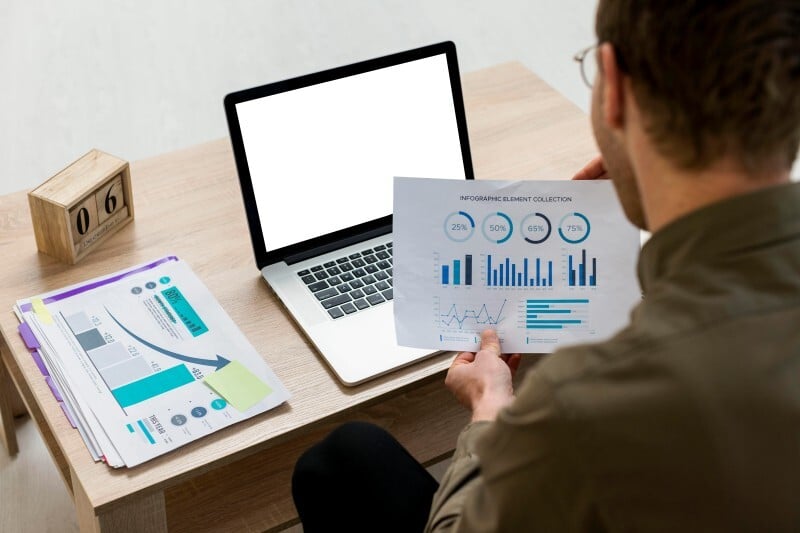 A BIM professional looking at the graph and chart 