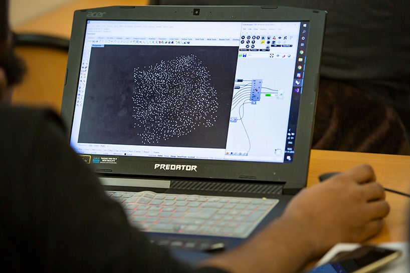 A Computational designer working on a parametric design