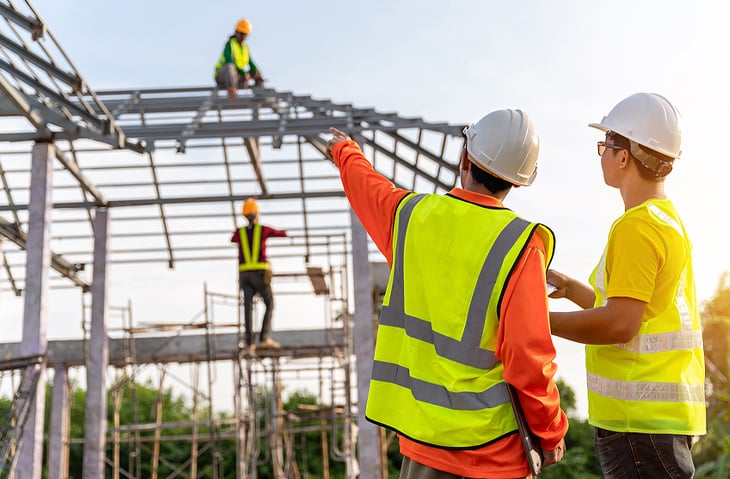 A civil engineer overseeing work on site