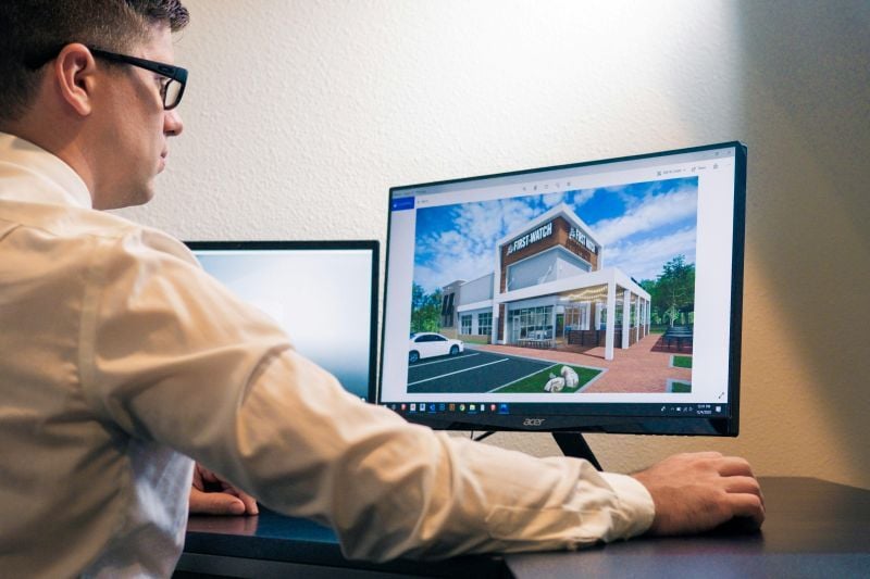 A computational BIM specialist printing a visualized 3D model