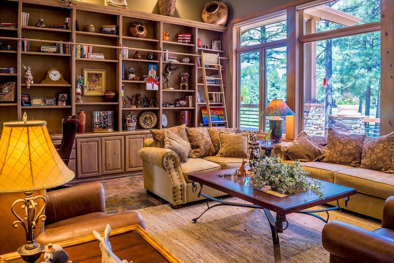 A luxurious living room interiors with lots of books, art, and crafts