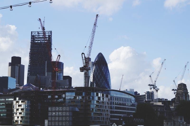 A project by City cranes and skyscrapers