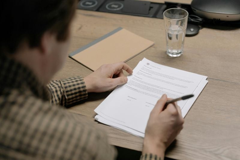 A recruiter going through multiple resume drafts