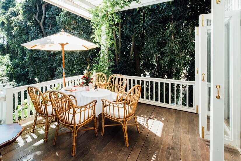 A vintage breakfast table setup in a balcony