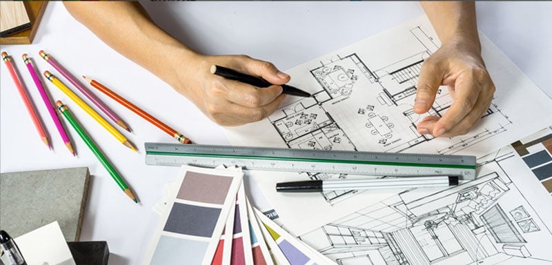 An  interior designer working on a plan