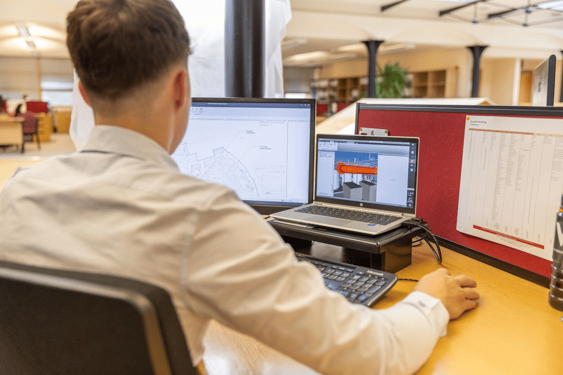 An architect working on a project using Archicad software
