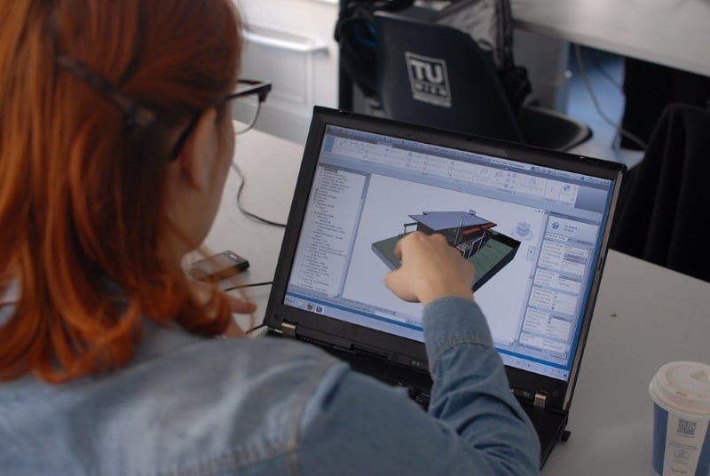 An engineer using Autodesk Revit software