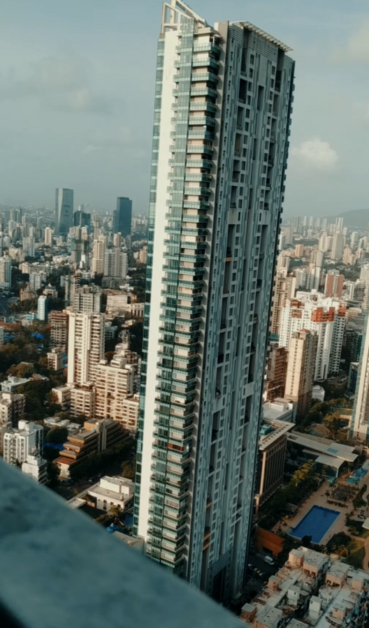 An image of Ahuja Tower, showing its impressive height and modern architectural design.