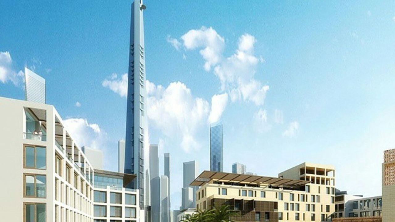 An image showing early-stage construction of Jeddah Tower with cranes and concrete framework