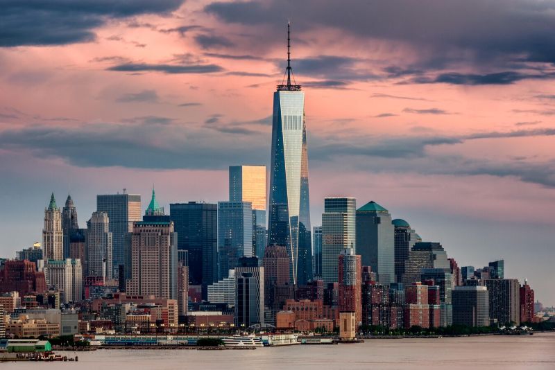 An image showing the One World Trade Center New York, together with the surrounding buildings