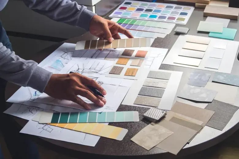 An interior designer selecting materials 