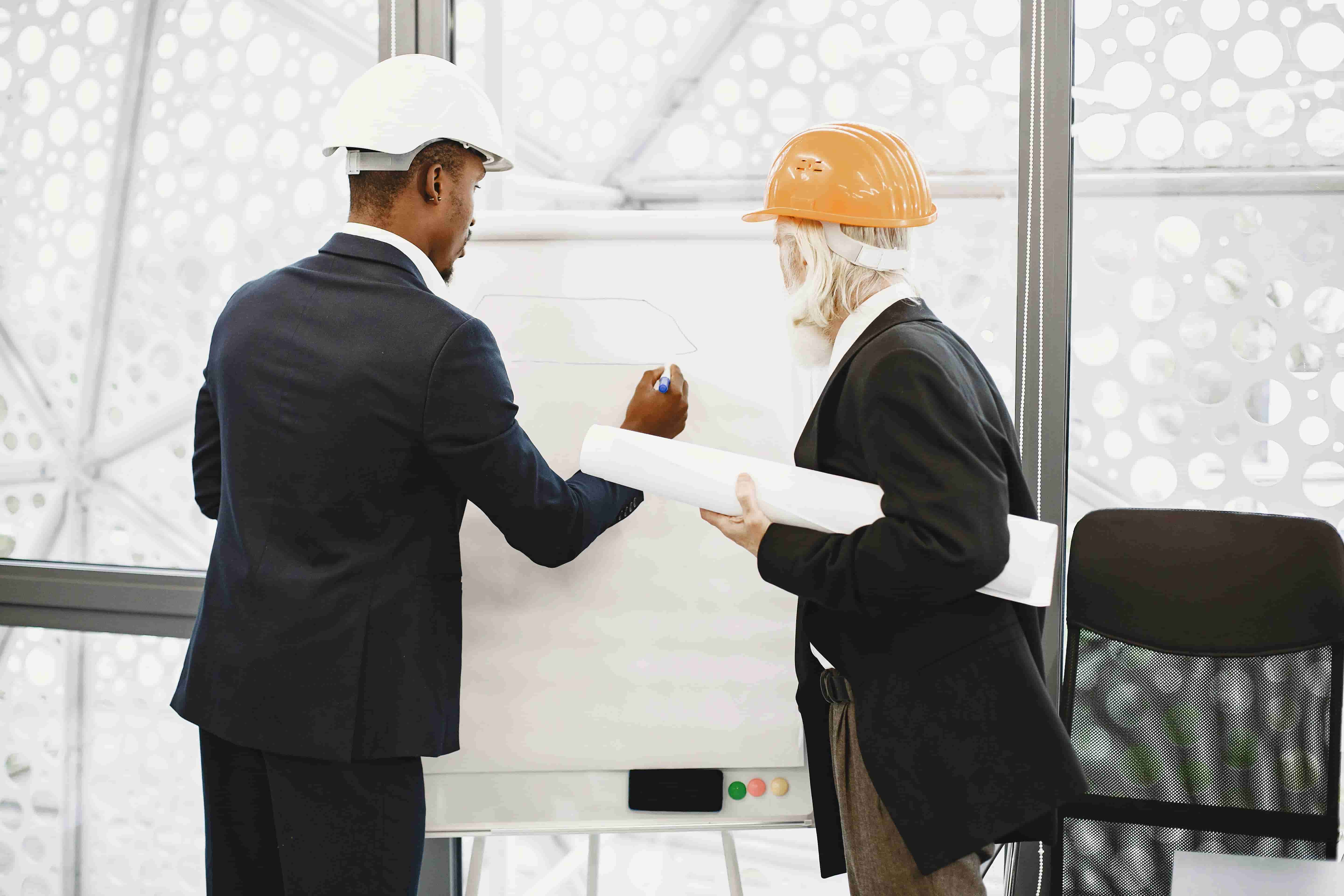 Architectural historians reviewing plans 