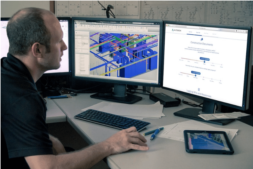BIM modeler assessing data for a project