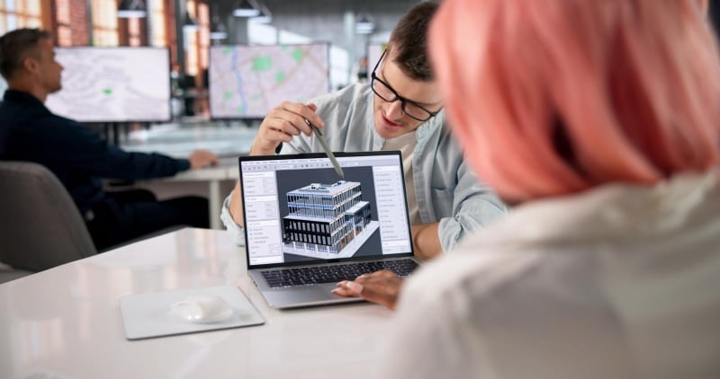 BIM team reviewing 3D coordination model.-1