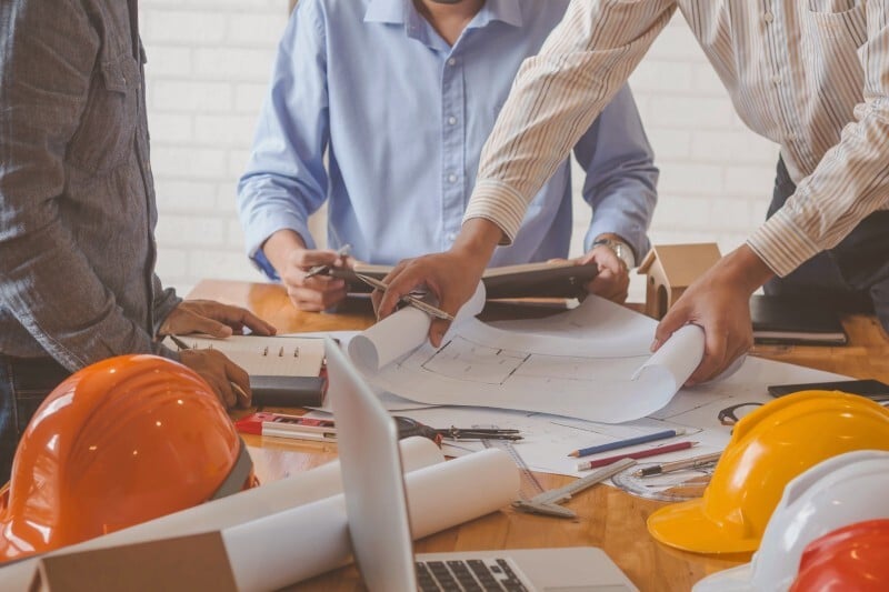 Civil engineers collaborating on a construction project.