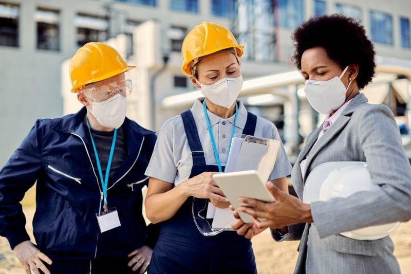 Construction Site manager discussing project