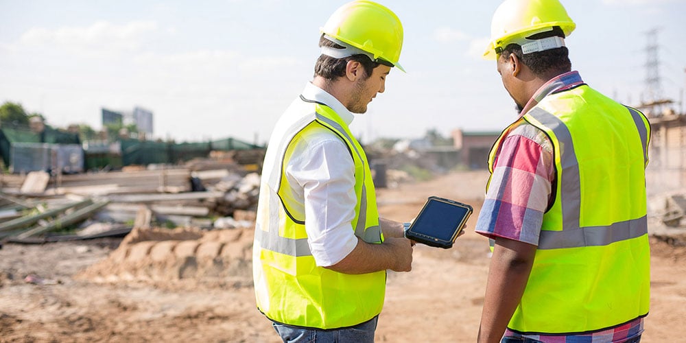 Construction inspectors inspecting on site