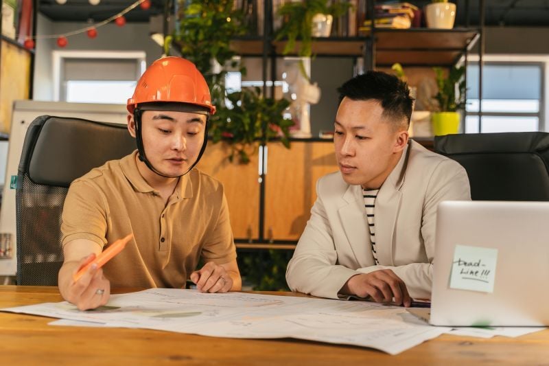 Construction manager discussing a plan