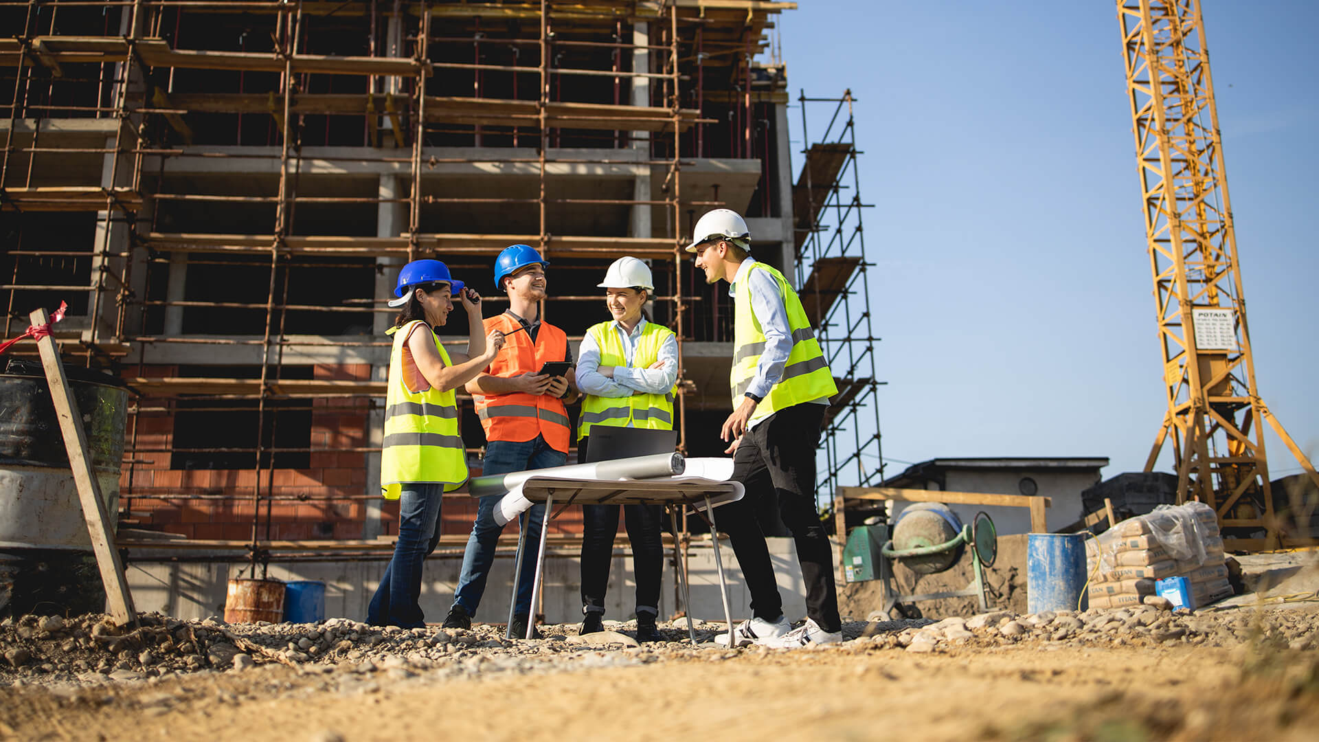 Construction managers discussing a project