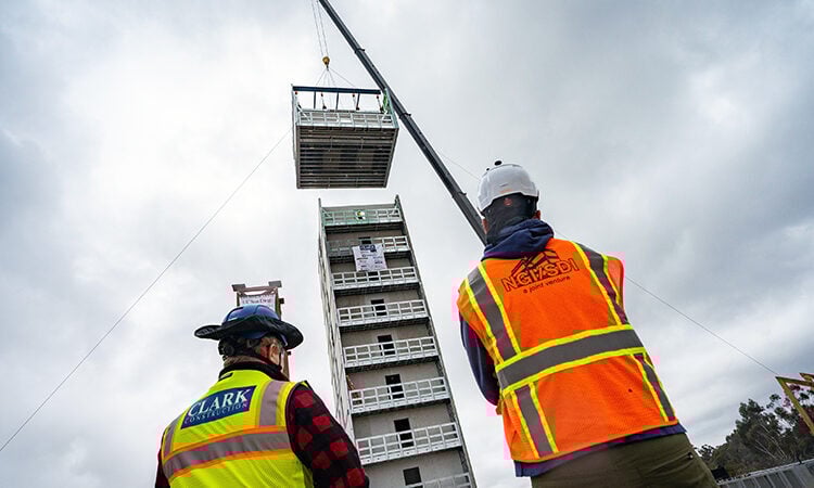 Construction managers supervising a modern  design project