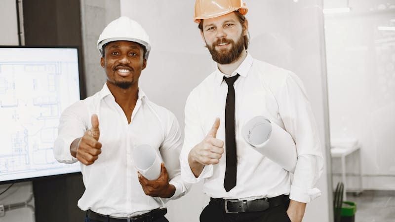 Construction team with plans