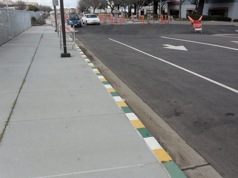 Curb with road markings