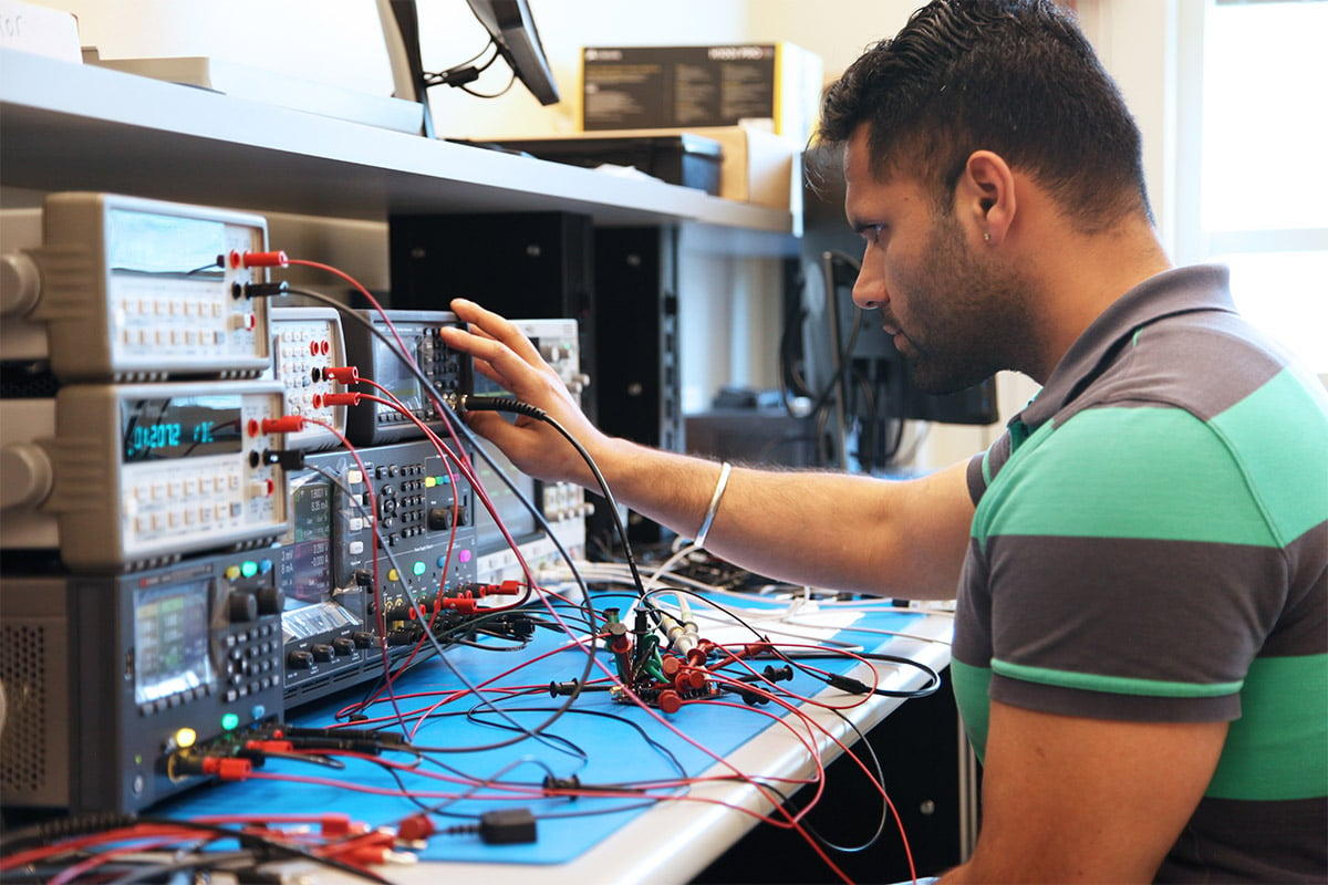 Electrical engineer reviewing the machines