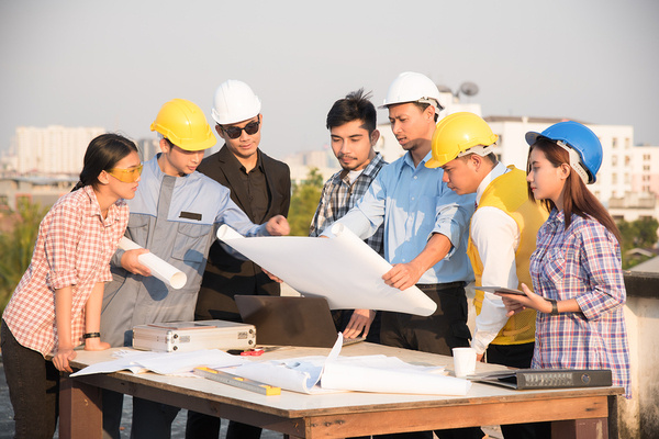 Engineers collaborating on site