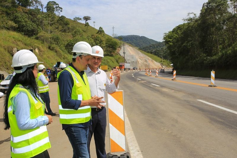 Engineers inspecting road construction