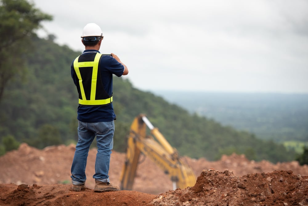 Geotechnical engineer supervising a site