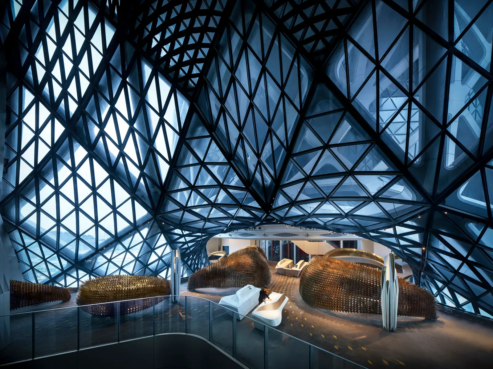 the interiors of Morpheus hotel by ZHA with its dark exoskeleton structures