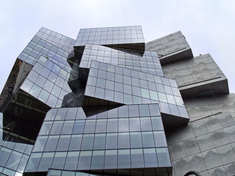 Image of an Abstract modern building with irregular glass structures.