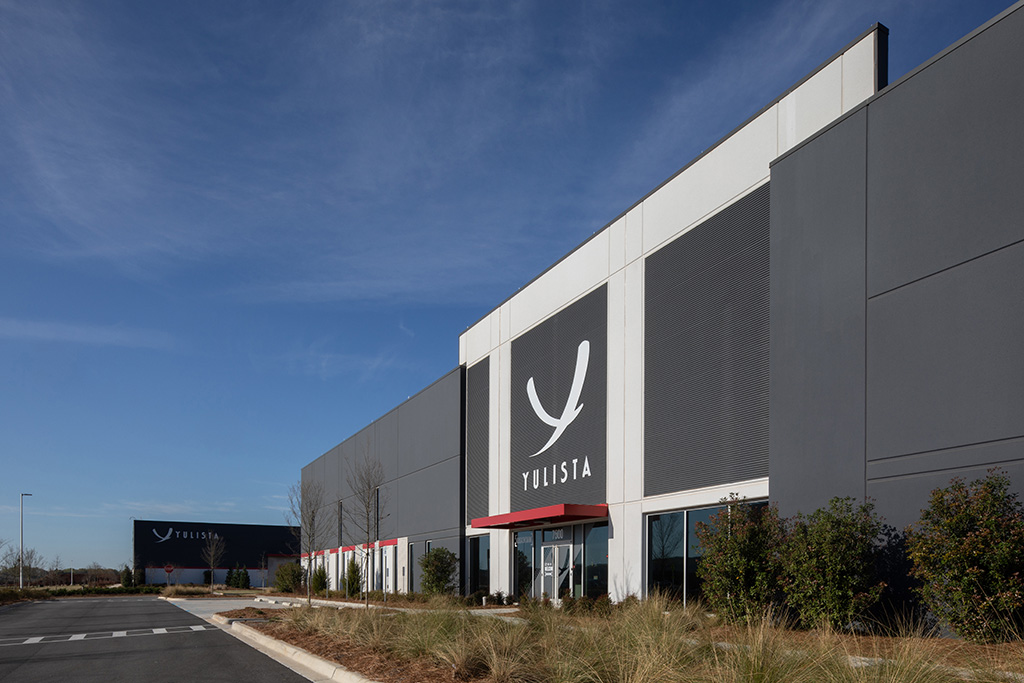 Industrial Building With Company Logo
