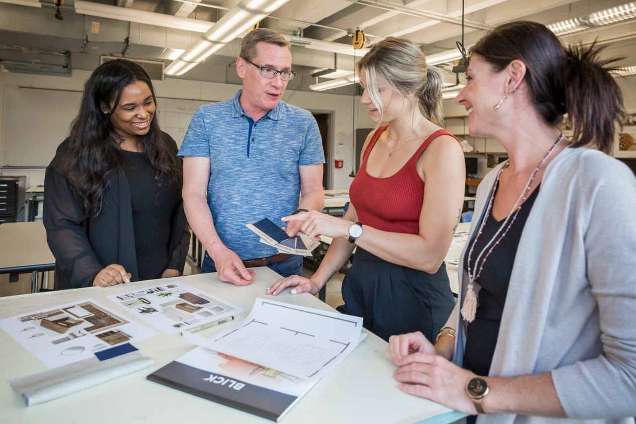 Interior designers discussing an assignment