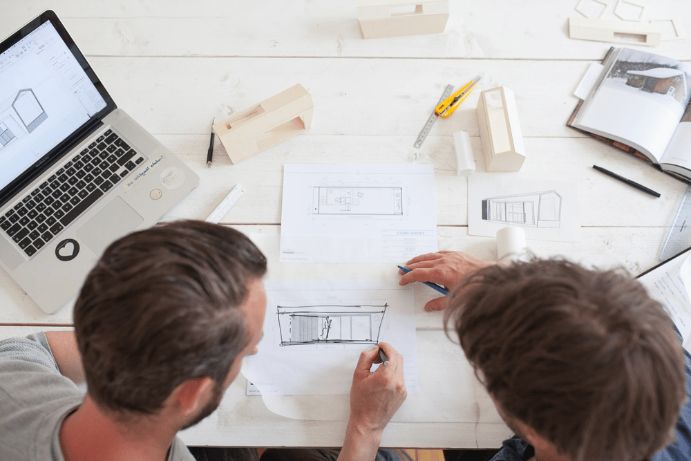 Junior architects collaborating on a project