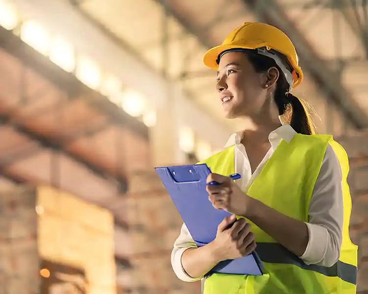 Junior civil engineer working on site.