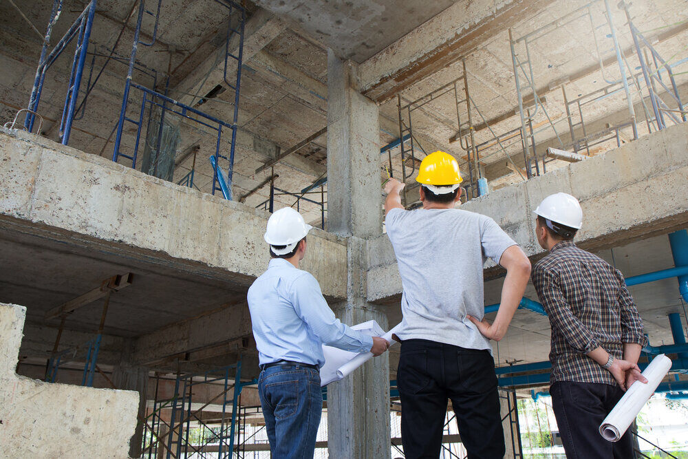 MEP engineers reviewing the progress of the construction site 