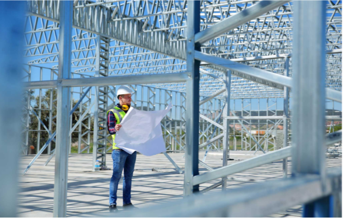 Structural engineer reading a drawing