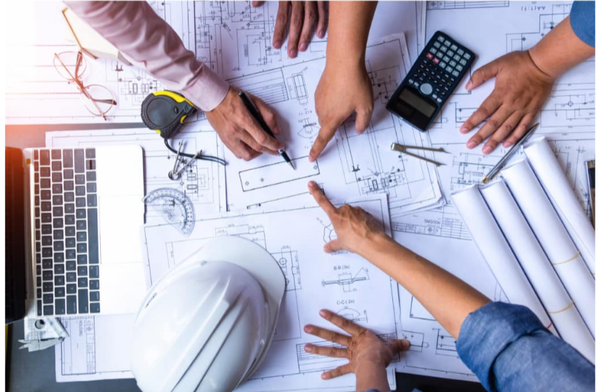 Engineers discussing a design
