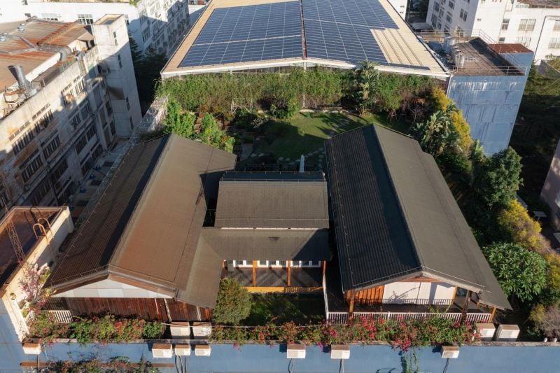 Sustainable buildings, roof gardens and rooftop solar panels.