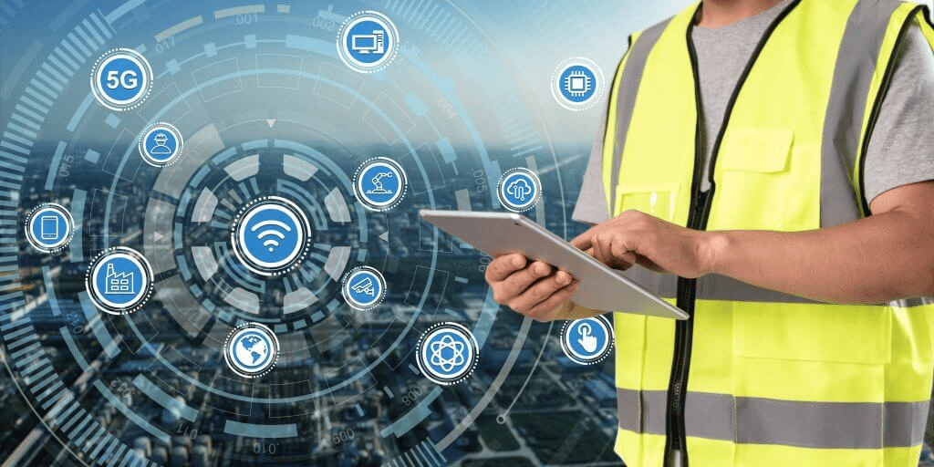 Technician monitoring smart building and IoT-enabled HVAC control systems.
