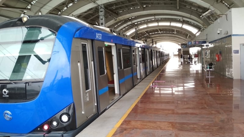 The Chennai Metro train stopped at an elevated station platform in Chennai.