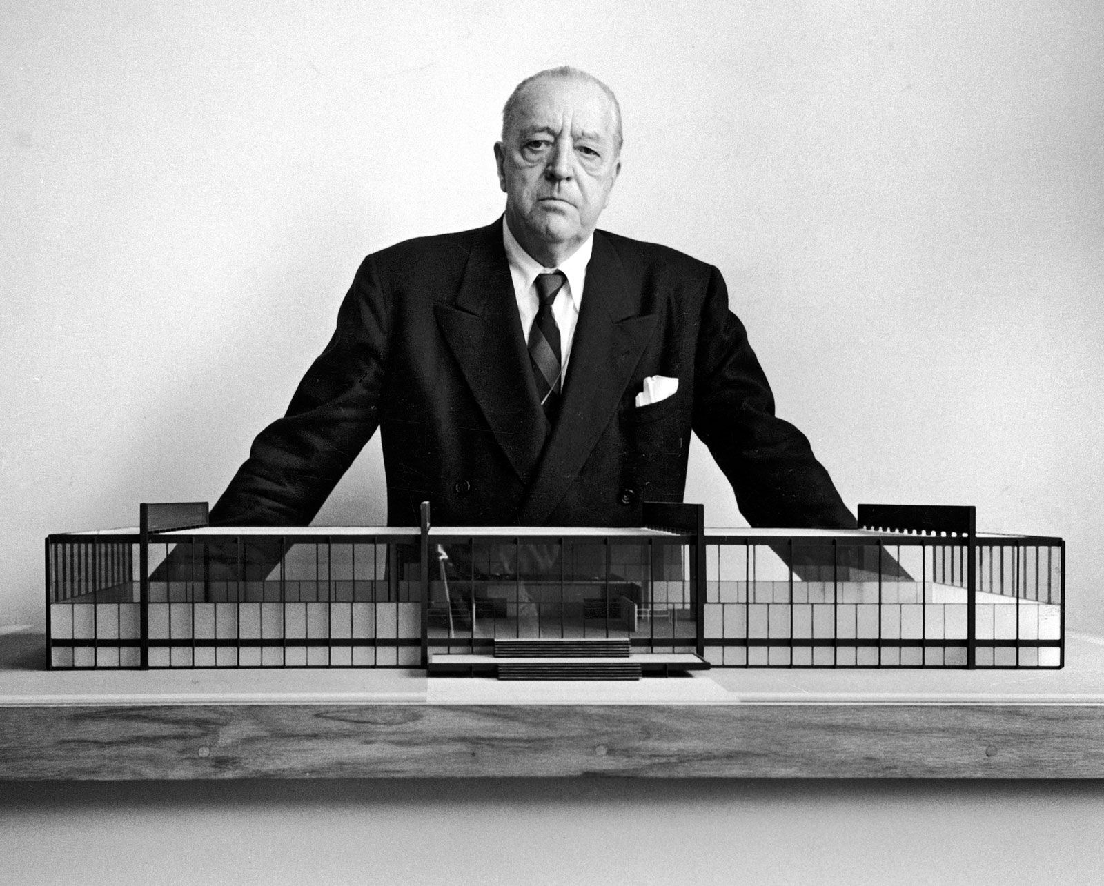 Mies van der Rohe  standing before his architectural institute