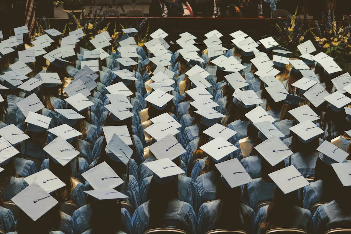 university graduates sitting in rows for convocation