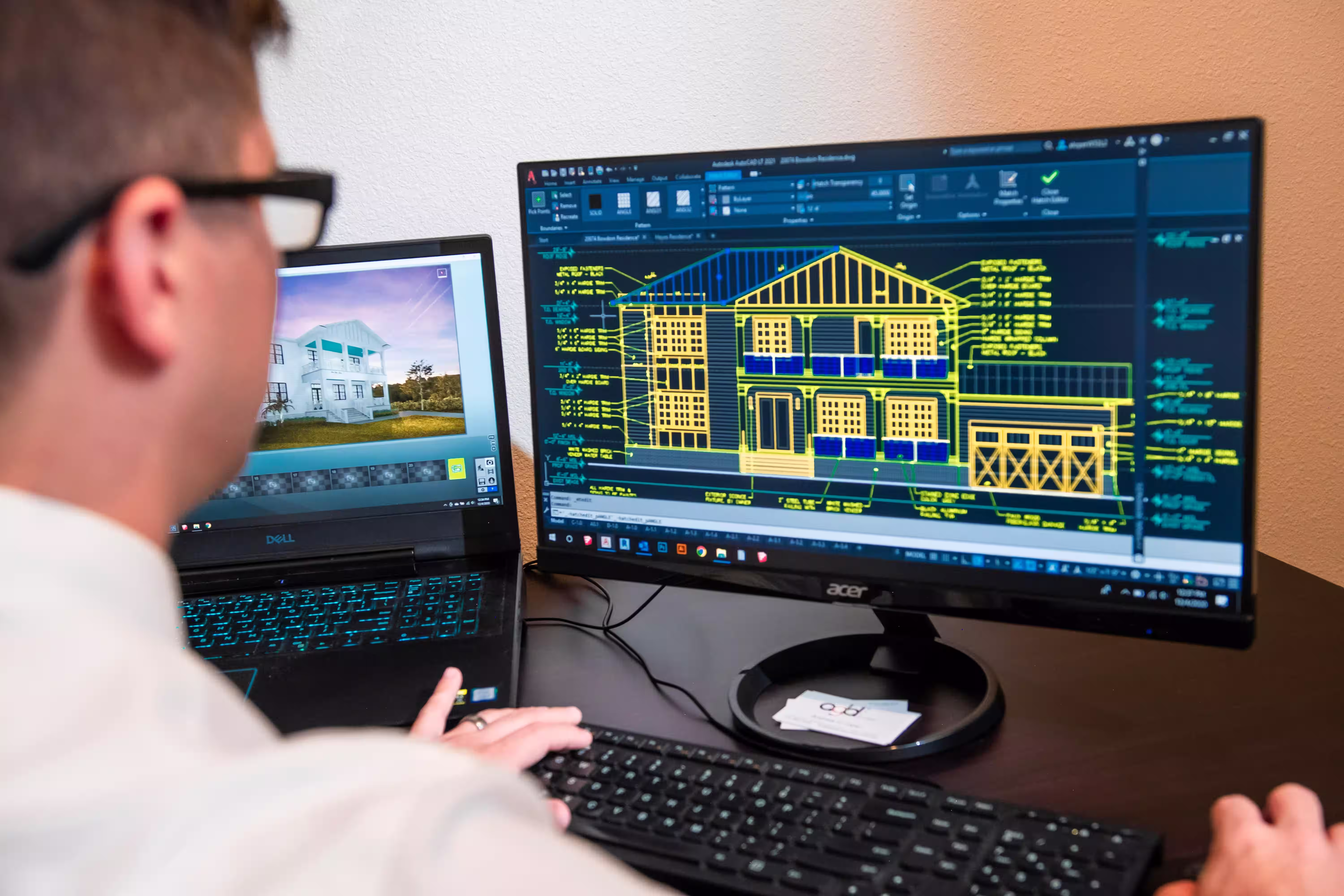An architectural technician using the BIM software on a project
